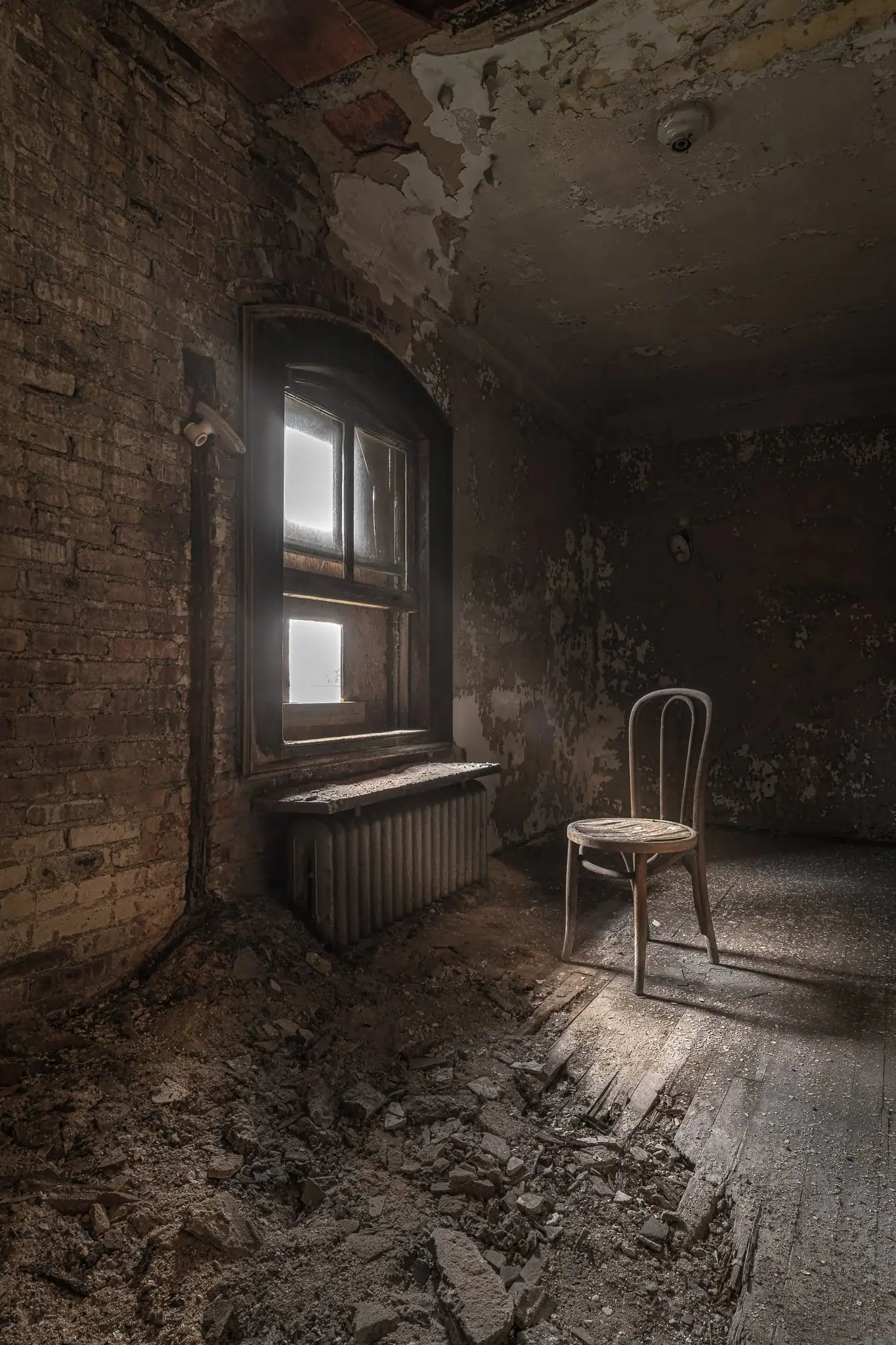 Abandoned staff hallway in Ellis Island hospital with closed doors