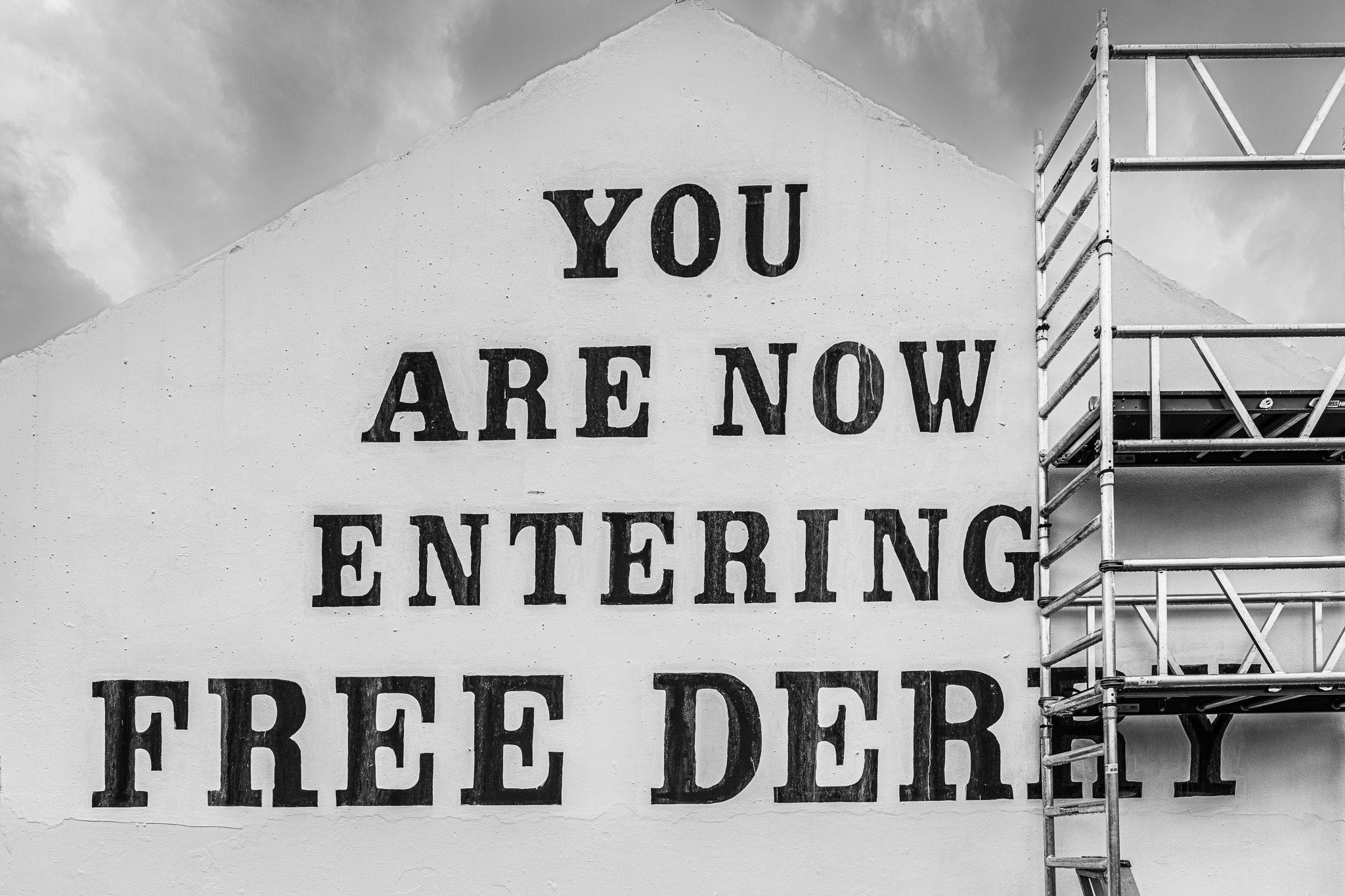 Free Derry Corner with Storm Clouds